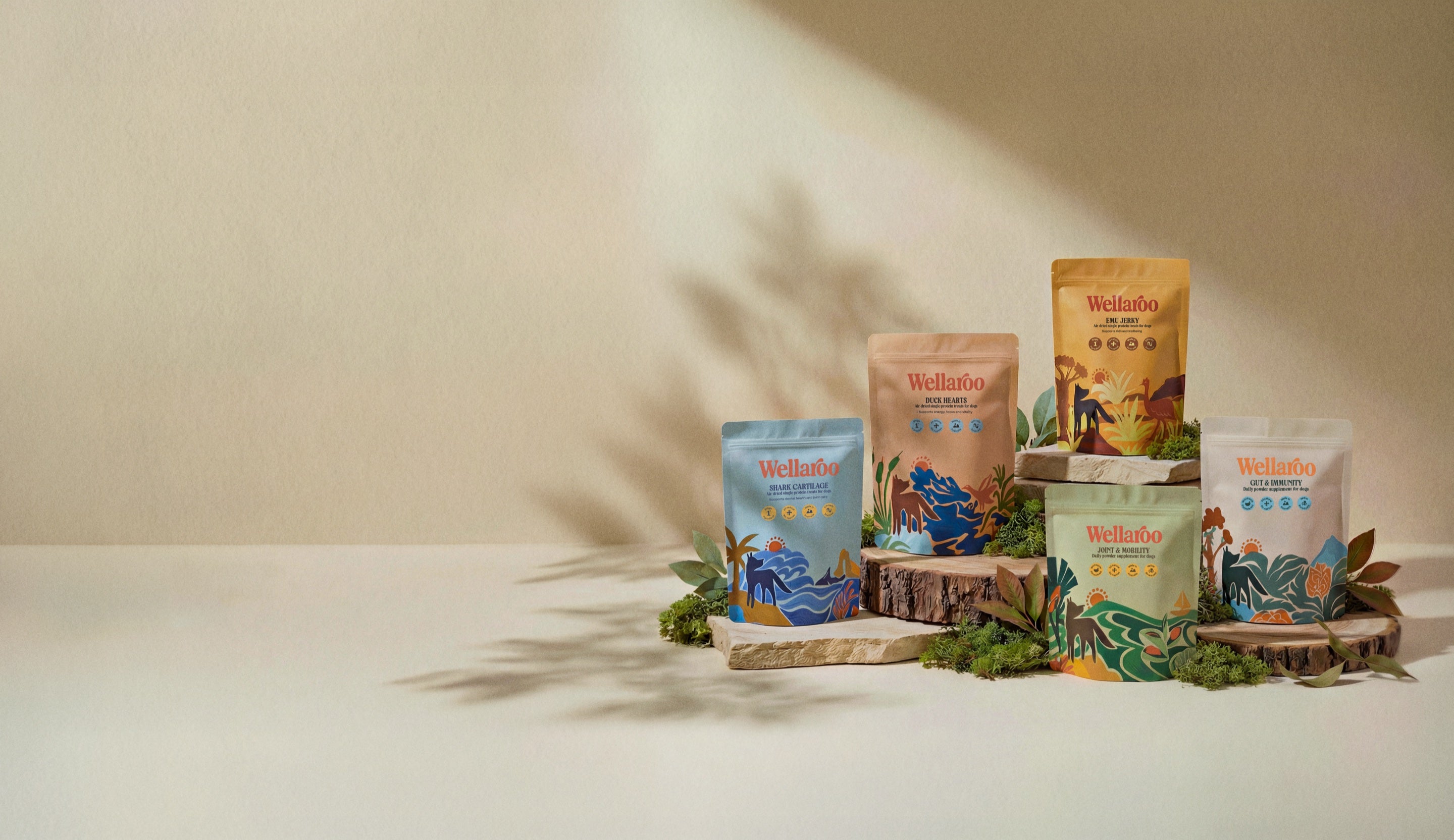 Wellaroo product lineup on natural wood display